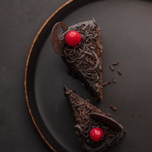 Cherry-Decorated Dark Chocolate Triangle Cake